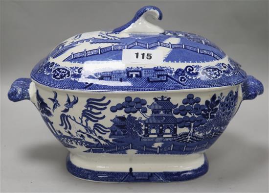 A Staffordshire blue and white Willow pattern soup tureen and cover